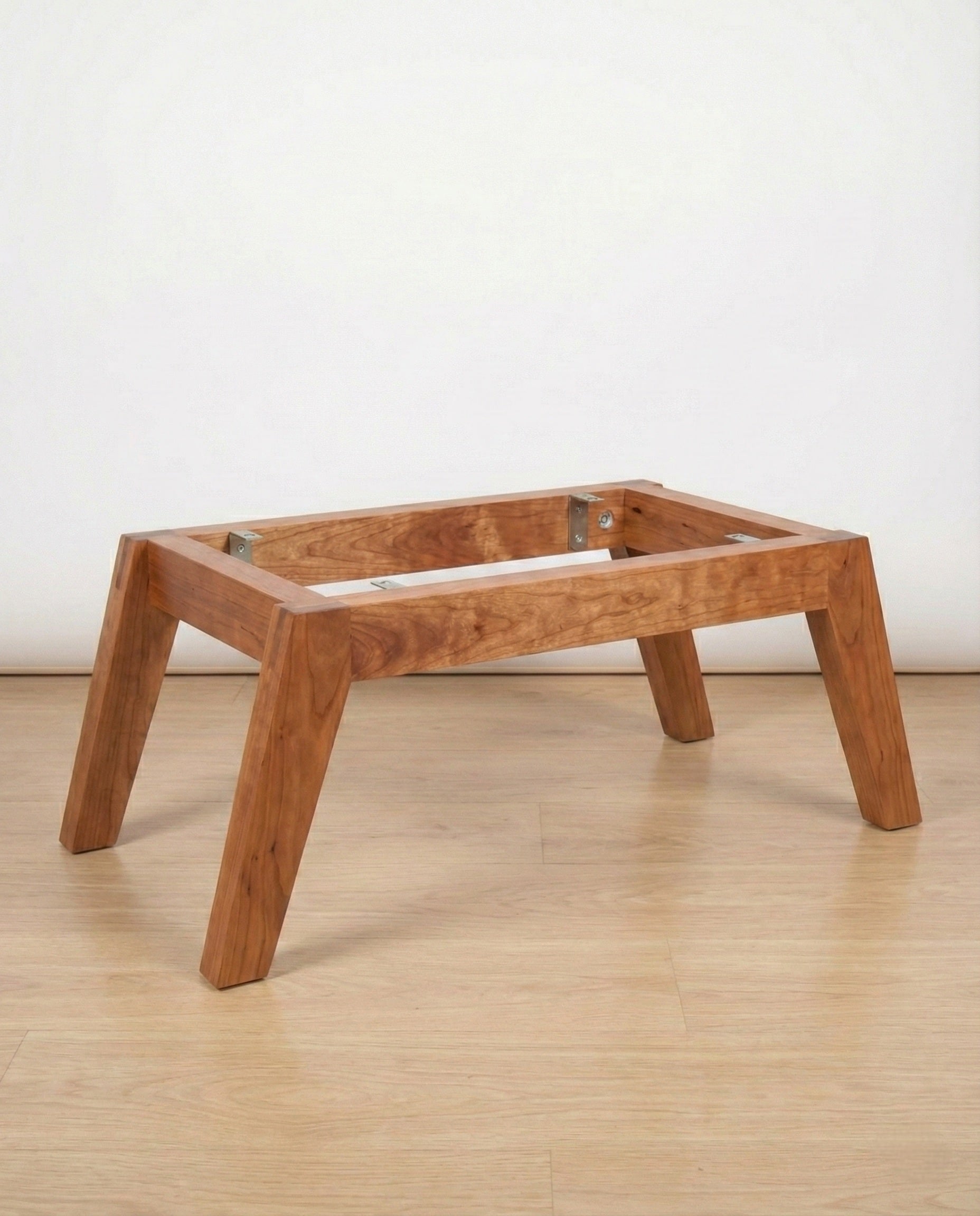 The Fjord solid wood coffee table base mid-century modern, side angle view – Artisan & Sons