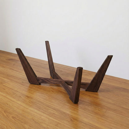The Nexus solid wood cross-base coffee table mid-century modern, hero lifestyle view – Artisan & Sons